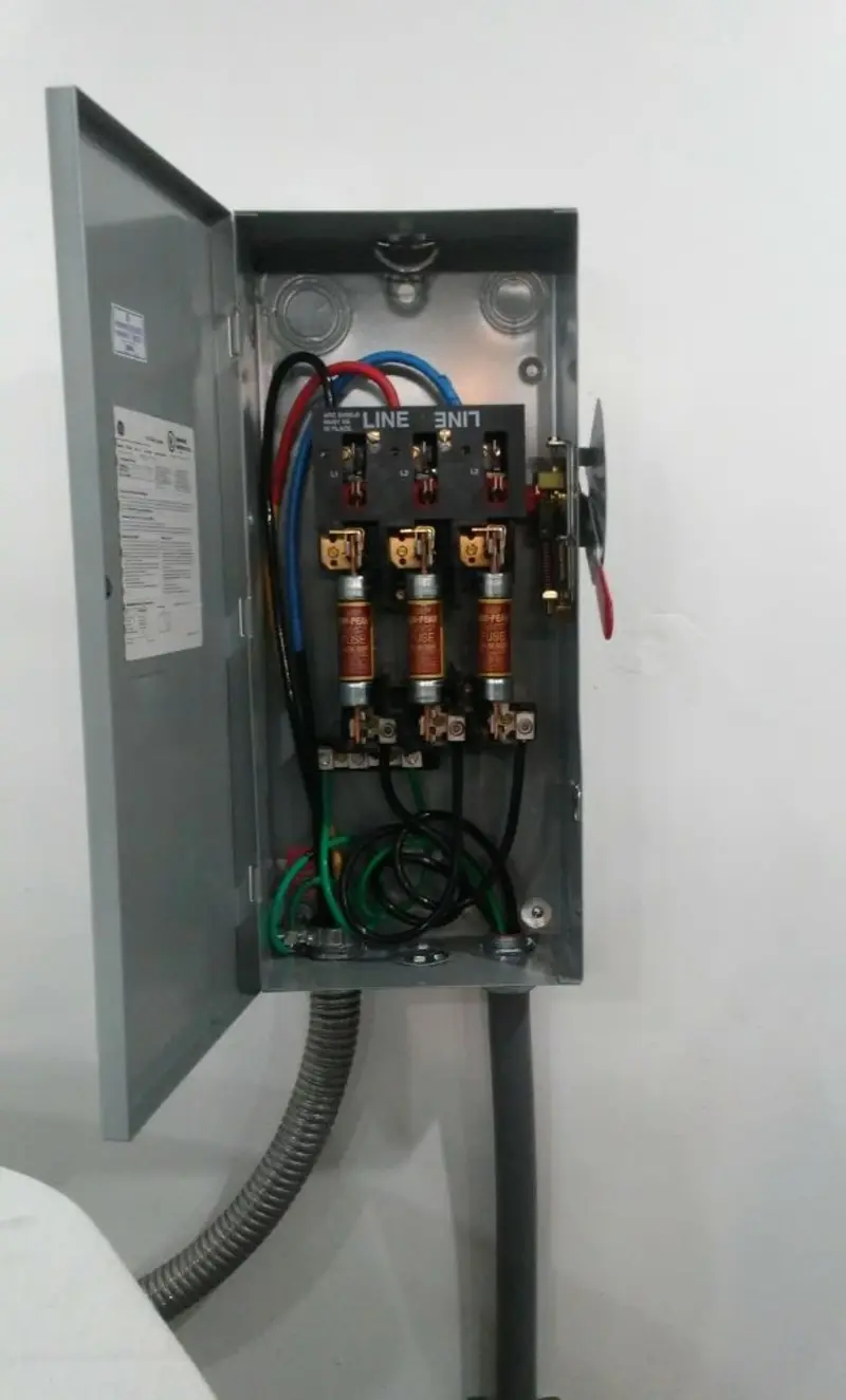 Three-phase disconnect switch installed for Smoke Detector Installation in Galliano